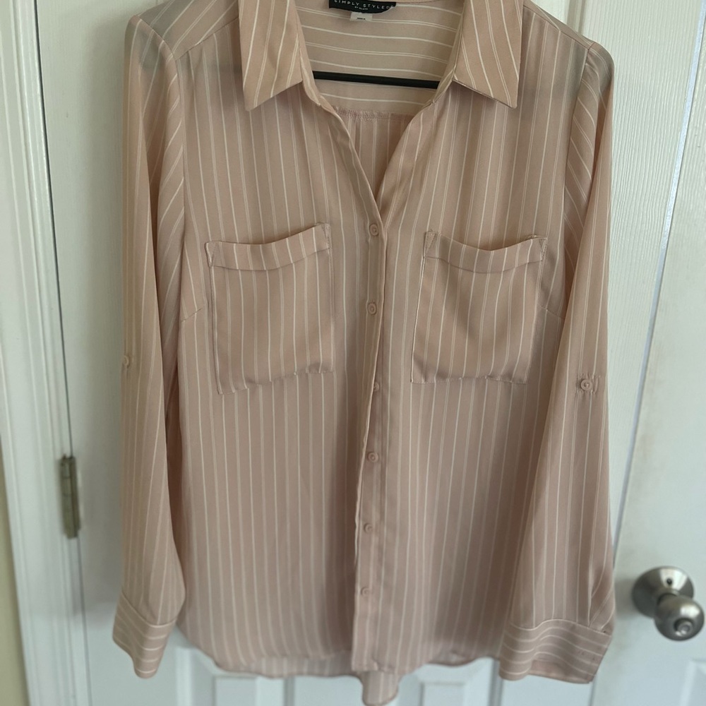 Simply styled light pink button up dress shirt